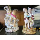 A 19th Century continental porcelain figure girl and boy in 18th Century dress, and another