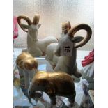 A pair of ornaments rams and a pair of elephant ornaments