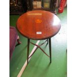 An Edwardian circular table.