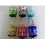 Six coloured cut glass glasses (one slightly a/f)