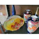 A Doulton Lambeth long necked vase (restored) and two Royal Nippon vases decorated poppies and a
