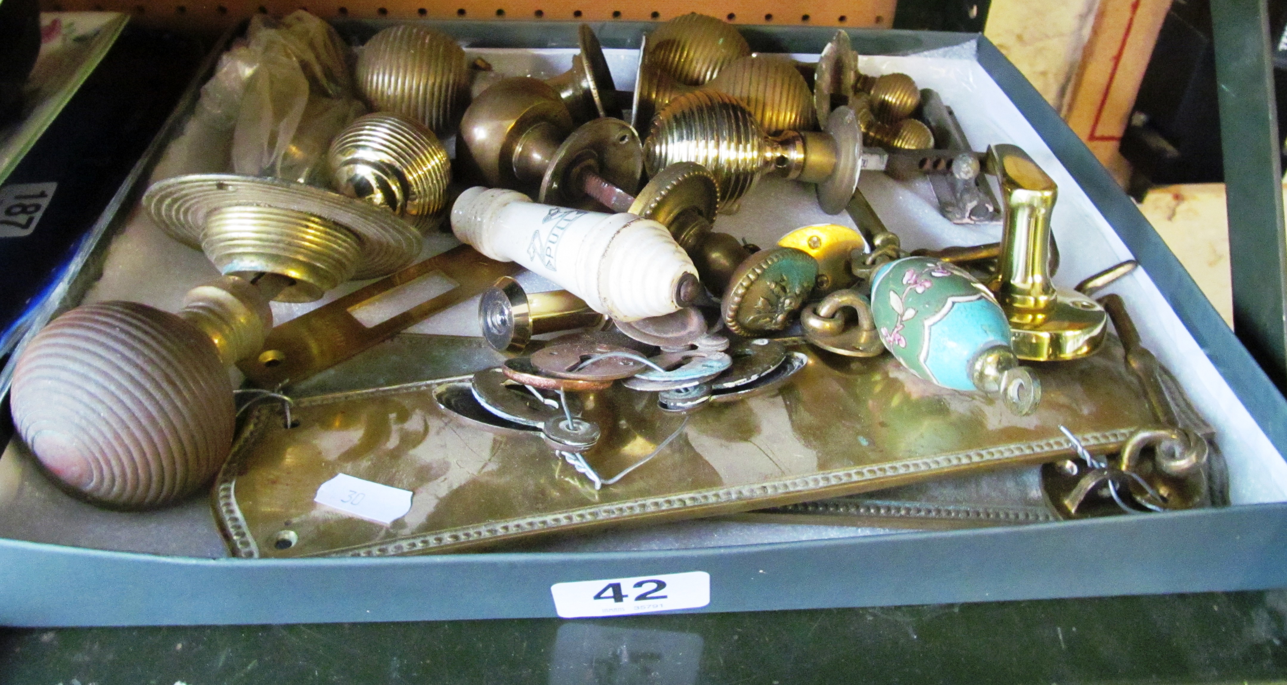 Some brass door furniture items