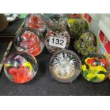 Six paperweights