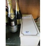 A bottle of Harrods champagne (boxed), bottle Rene Jardin champagne and a bottle of Carva.