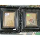 Two tapestry pictures in black frames.