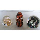 A Selkirk paperweight, Avondale paperweight and another