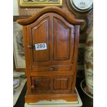 A miniature armoire