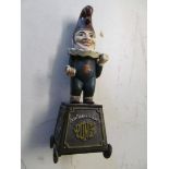 A modern Mr. Punch five cent cigar dispenser