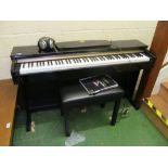 A Yamaha Clavinova in black lacquer case with stool