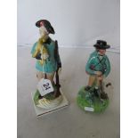A Walton style figure man with gun and dog and another Staffordshire figure man with gun and duck