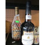 A bottle of Harveys Bristol Cream and a bottle of Bols apricot Brandy