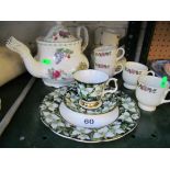 A Wedgwood coffee set, Royal Albert teapot and a trio