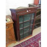 A 19th Century mahogany corner cabinet