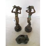 A pair of Art Deco spelter figures Le Printemps and L'Automne and a metal elephant