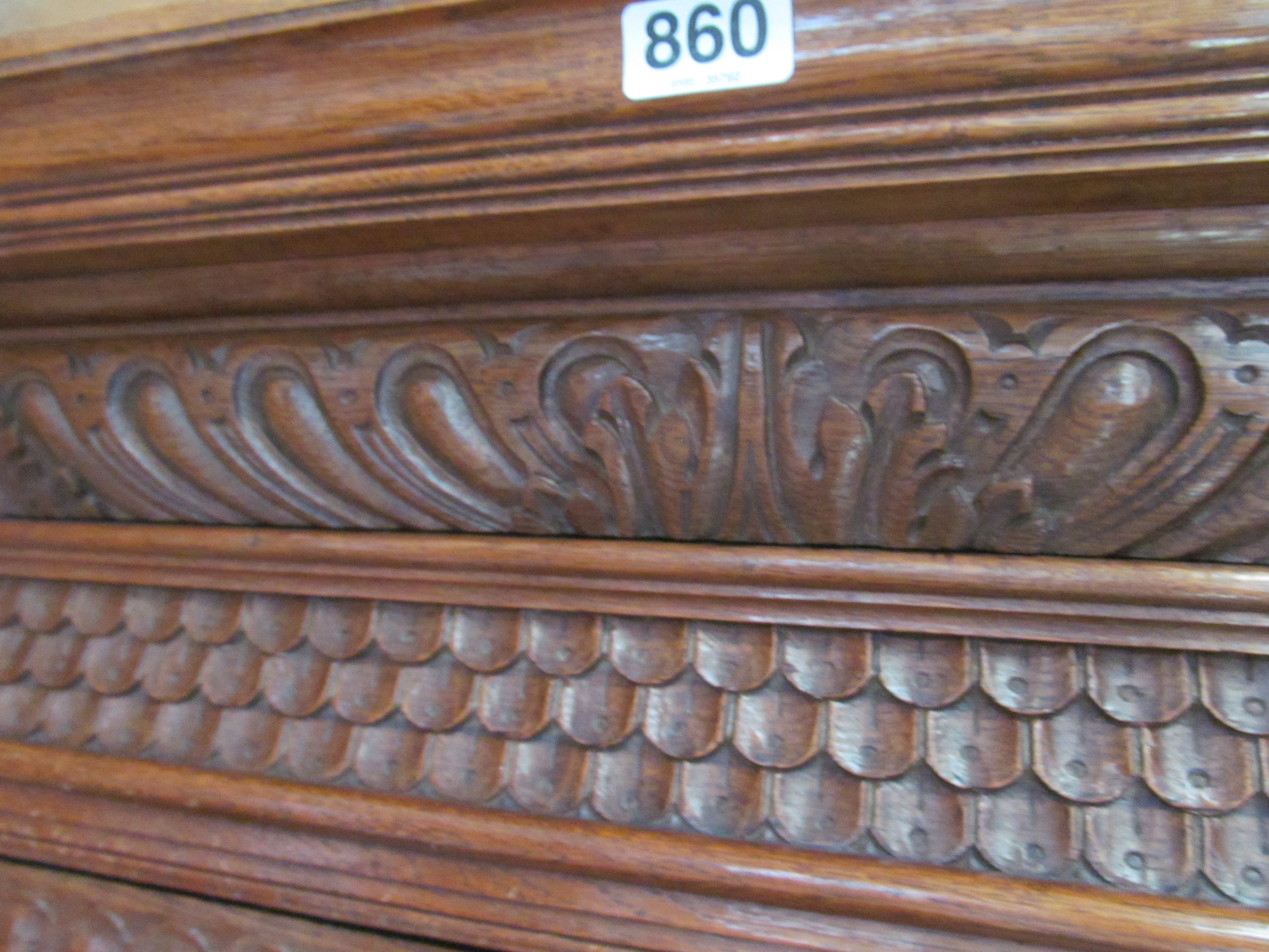 A continental oak cabinet with carved decoration, stained glass upper door and panelled door - Image 2 of 3