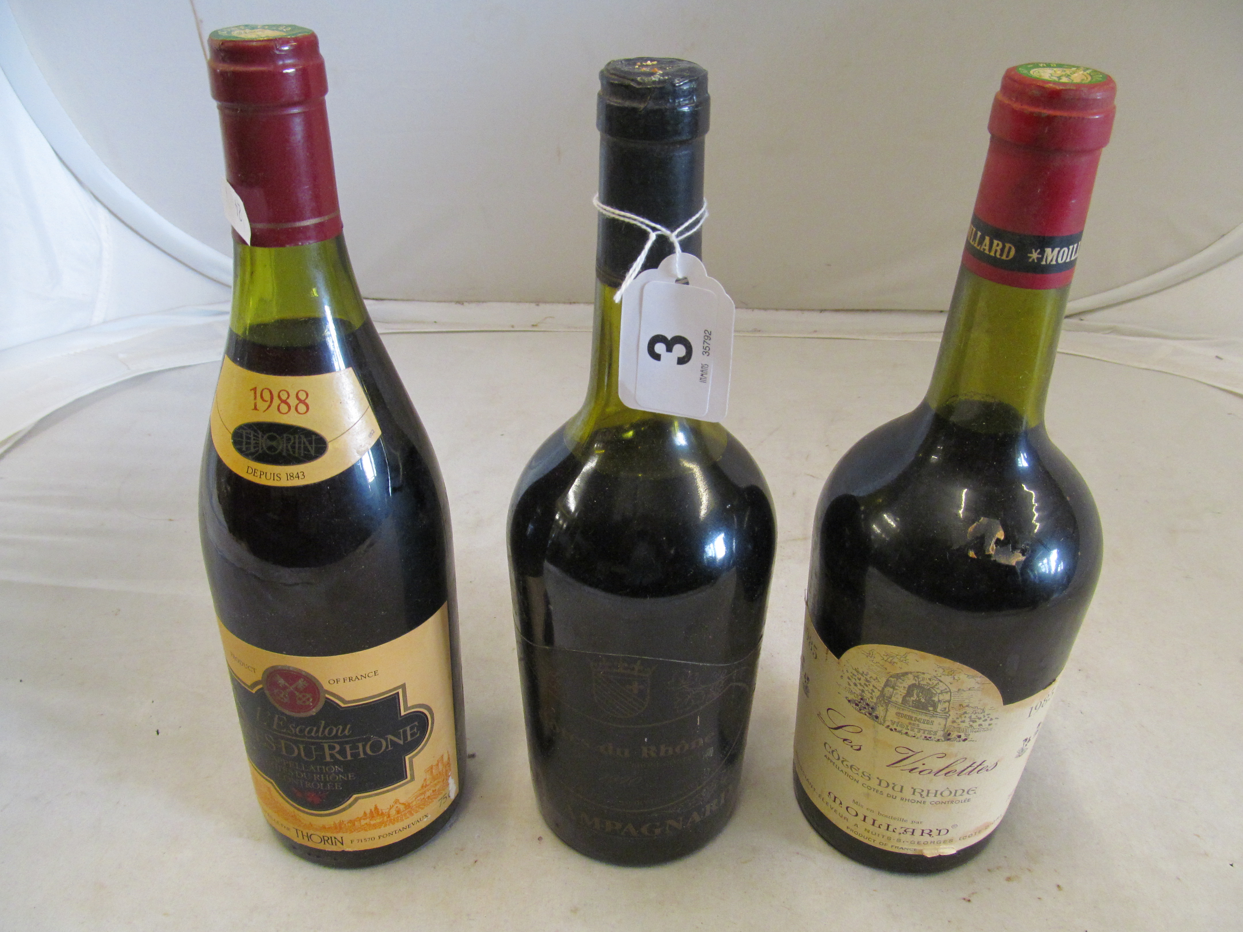 Three bottles Cotes du Rhone, 1985 les Violetties Thorin 1988, la Champagnard 1990.