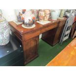 A 19th Century mahogany twin pedestal sideboard with three frieze drawers and two arched panelled