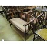 An Edwardian salon settee and two low chairs