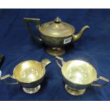 A Walker & Hall silver teapot (initialled R), silver milk jug and sucrier 25 ozs