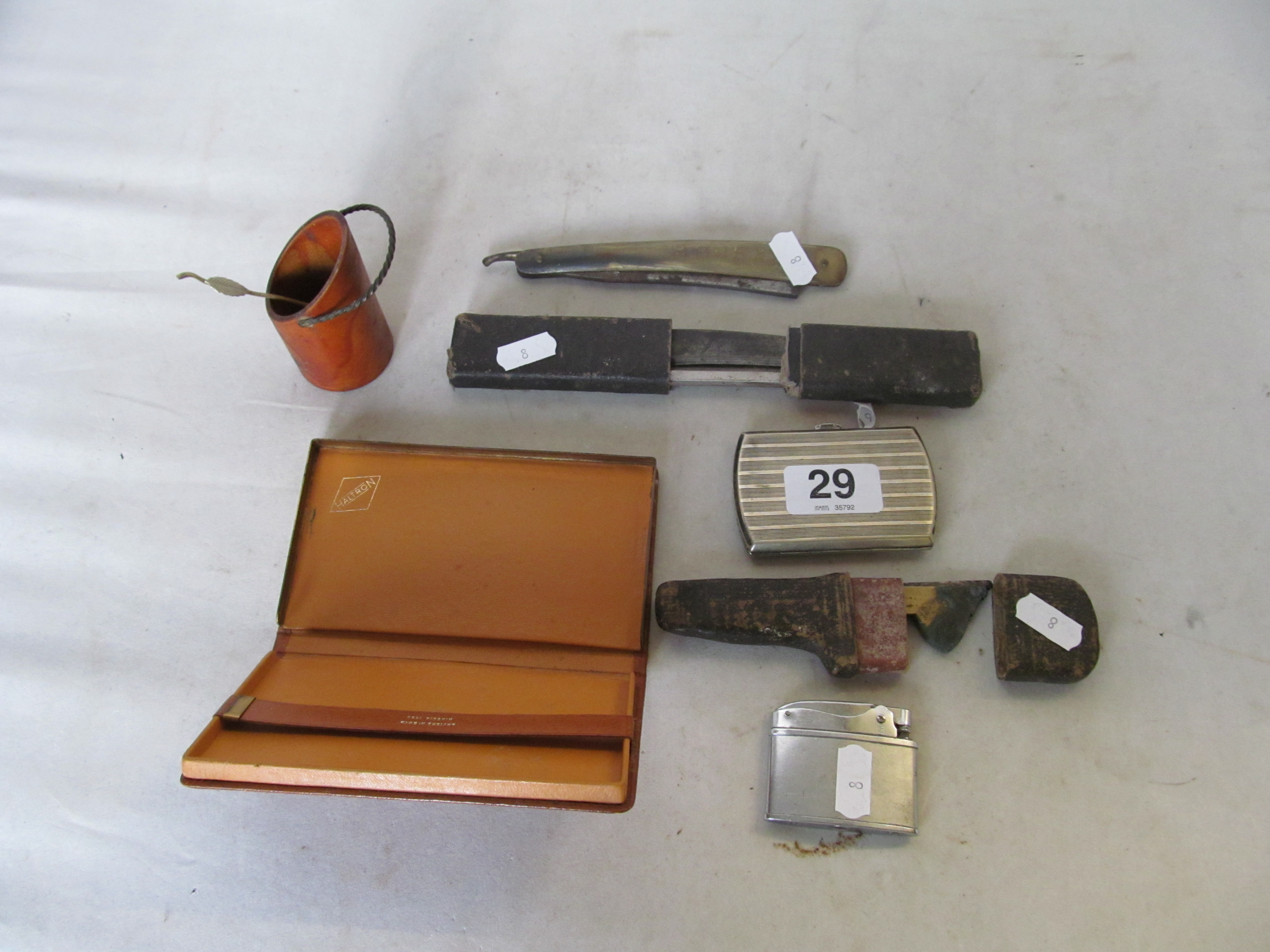 A lighter, cigarette case et cetera