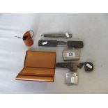 A lighter, cigarette case et cetera