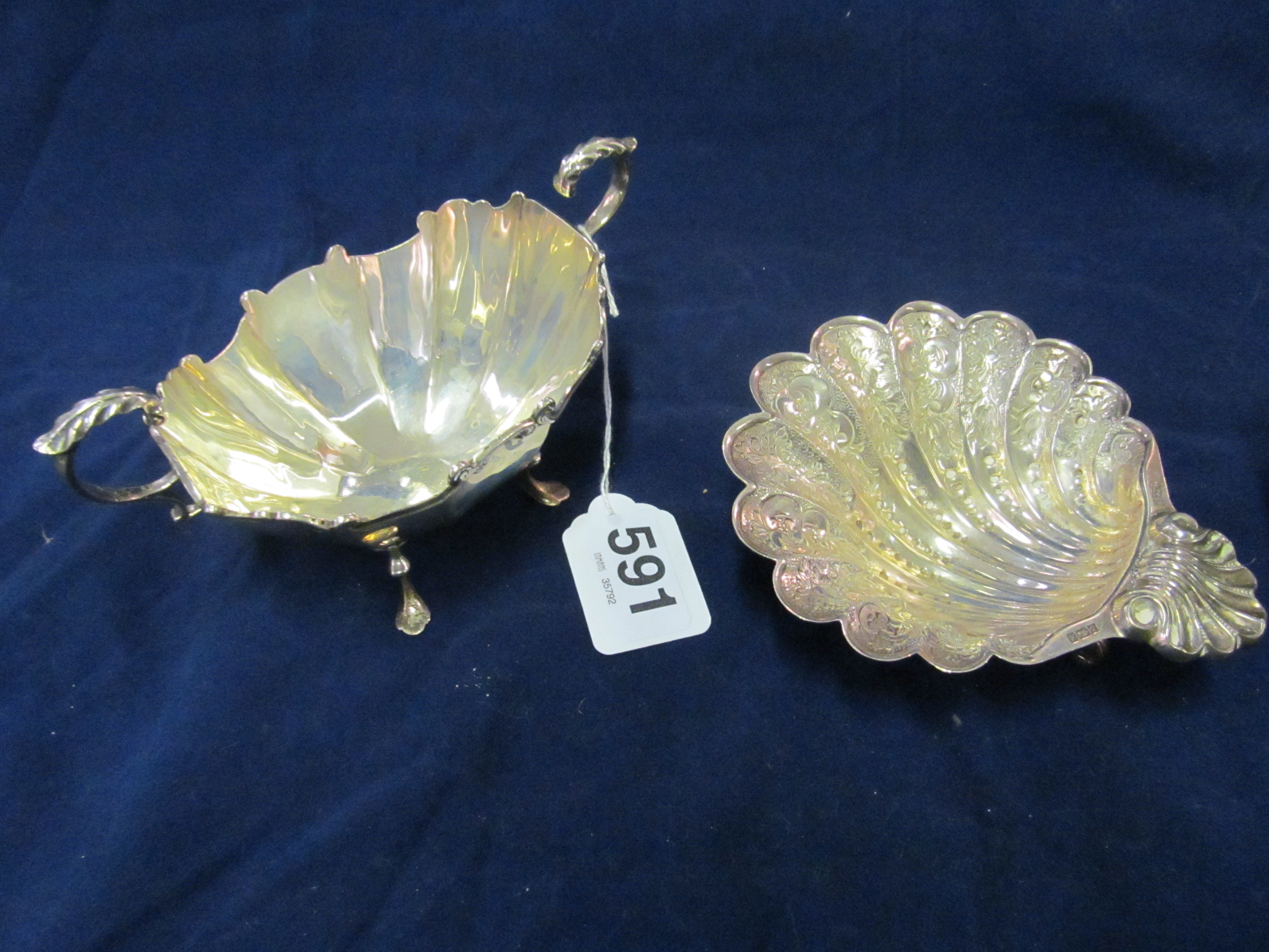 A silver shell dish 3.7 ozs and a sucrier 4 ozs