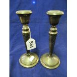 A pair of silver candlesticks