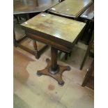 An early 19th Century rosewood work/games table with fold top on fluted supports and platform base