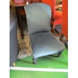 A blue dralon nursing chair