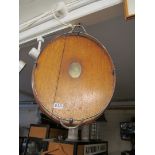 An Edwardian oak tray with plated rim.