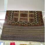 A Kelim style rug central section of square on cream ground and striped ends