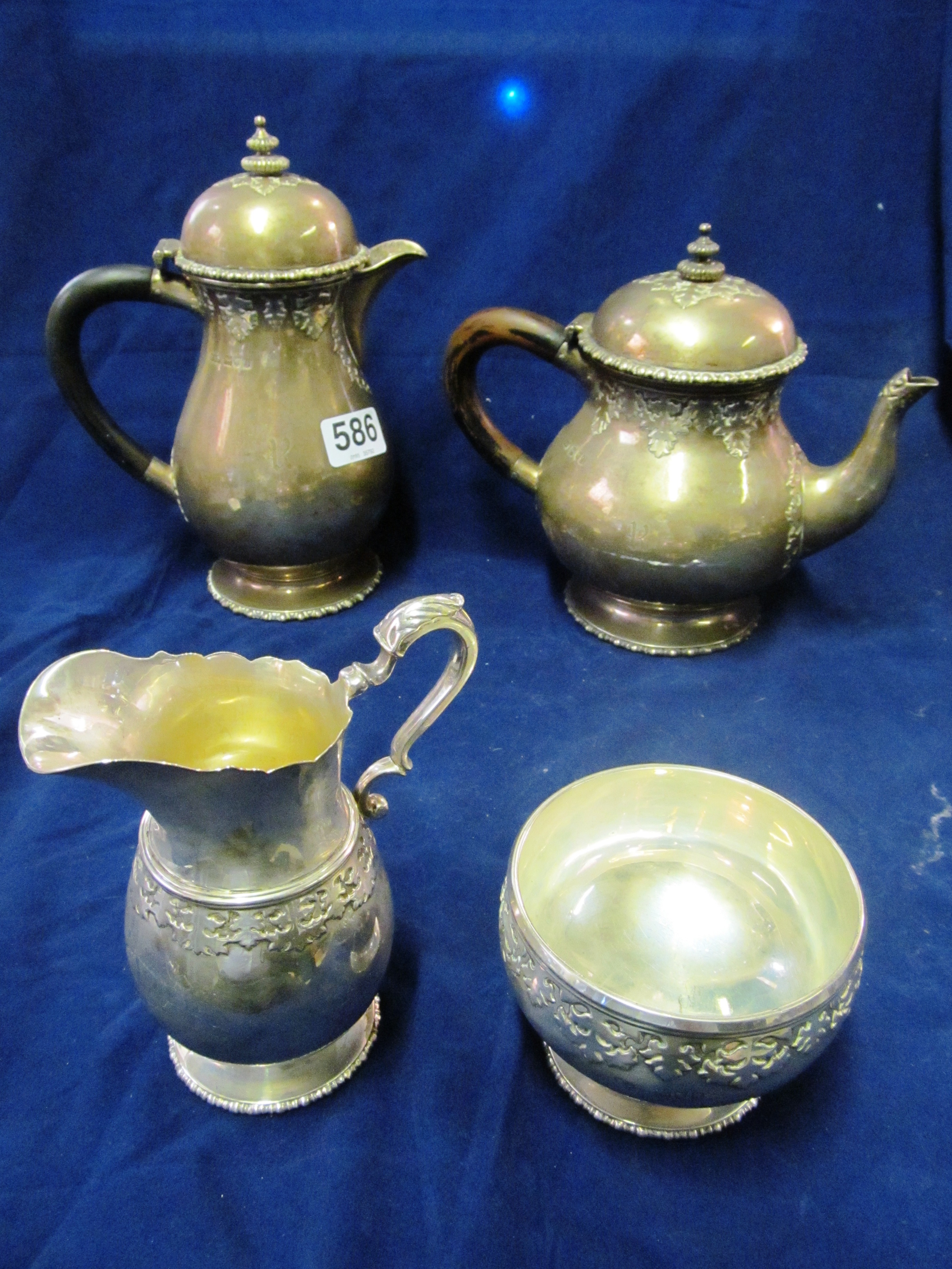 A silver teapot and coffee pot (initialled R), sucrier and jug 53.5 ozs