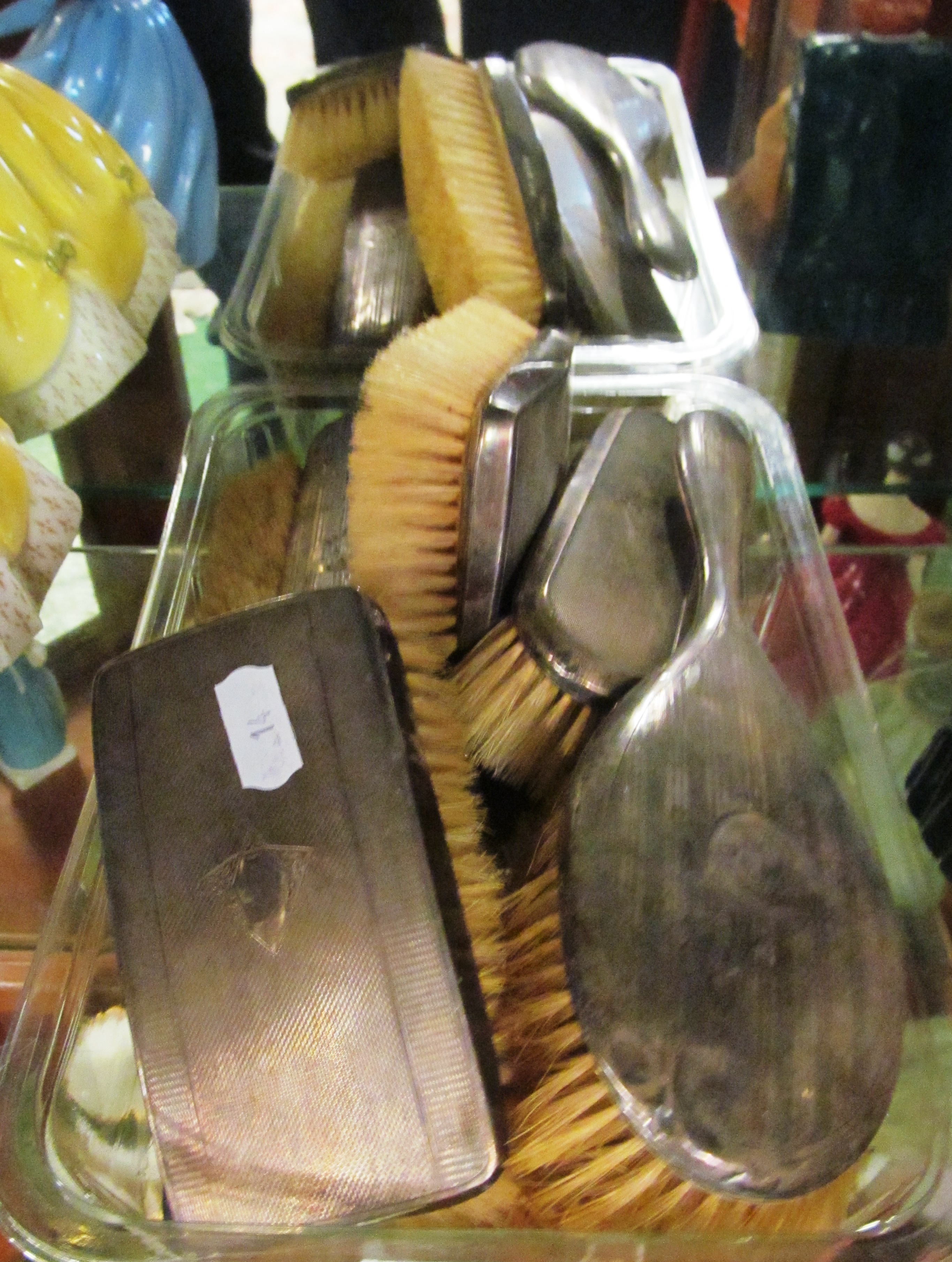 Some silver dressing table brushes and mirror