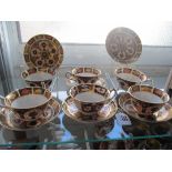 Five Royal Crown Derby cups and saucers and another