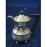 A silver coffee pot