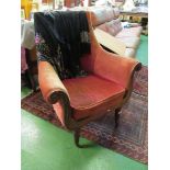 A Regency mahogany armchair on turned legs.