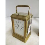 A 19th Century brass carriage clock with repeat and strike