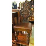 A pair 19th Century oak hall chairs with naturalistic leaf form back