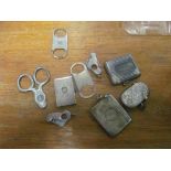 Various silver cigar cutters and vesta cases