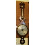 A mahogany banjo barometer.