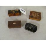 A tortoishell box and three other boxes