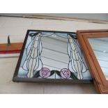 An Art Deco mirror.