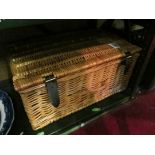 A wicker hamper and a wicker basket.