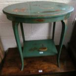 A green lacquer oval table.