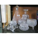 Two glass decanters, powder bowl and knife rests.