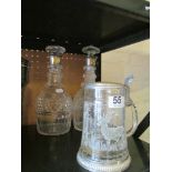 A pair of Mappin & Webb silver collar decanters (a/f) and a tankard etched stags