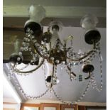 A five branch gilt and glass chandelier