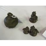 Various oriental bronze animal weights and a bell