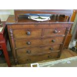 A Victorian chest of two short three long drawers (feet missing)