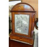 An Edwardian mahogany bracket clock with inlaid decoration, silvered dial with chime/silent slow/